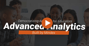 First slide of the Mindex Advanced Analytics Overview video featuring a teacher engaging with her students. A play button is visible, inviting viewers to watch the video and learn more about Mindex Advanced Analytics.