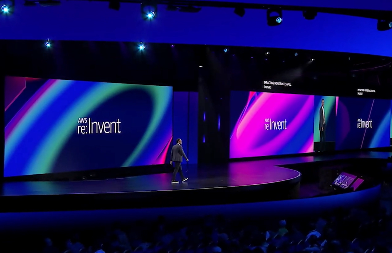 Dr. Swami Sivasubramanian standing on stage at AWS re:Invent 2024, moments after the SchoolTool video was showcased during the Data & AI keynote.